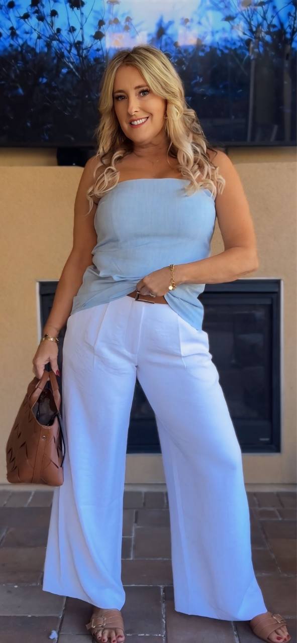 Blue tube top with white wide-leg linen pants