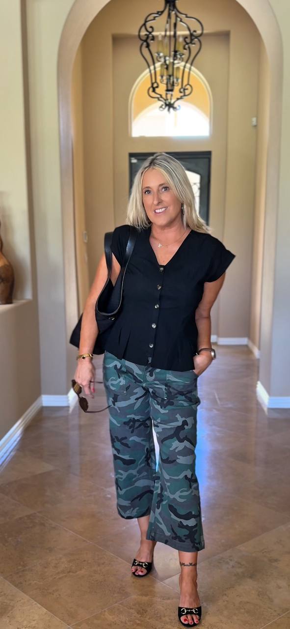 Linda Resendiz wearing camo pants and black peplum top